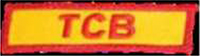 Dieses gelbe Kennzeichen mit roter Umrandung in Form eines Rechtecks, enthält die drei roten Großbuchstaben T C B. Diese Abkürzung steht für „Taking Care of Business“, übersetzt „sich um das Geschäft kümmern“.
