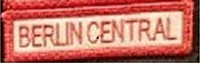 Brustpatch mit dem Schriftzug „BERLIN CENTRAL“, rote Schrift auf weißem Grund, rot umrandet