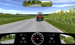Sie fahren außerorts mit knapp 40 km/h. Vor Ihnen fährt ein Traktor, der rechts blinkt.